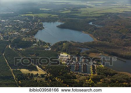 "Aerial view, holiday homes with moorings, Rheinsberg Marina, Rheinsberg Harbour Village, Maritim Hafenhotel Rheinsberg, Grosser Rheinsberger See Lake, Rheinsberg, Mecklenburg Lake District, Brandenburg, Germany, Europe" View Large Photo Image Stock Photograph - "Aerial view, holiday homes with moorings, Rheinsberg Marina, Rheinsberg Harbour Village, Maritim Hafenhotel Rheinsberg, Grosser Rheinsberger See Lake, Rheinsberg, Mecklenburg Lake District, Brandenburg, Germany, Europe". Fotosearch