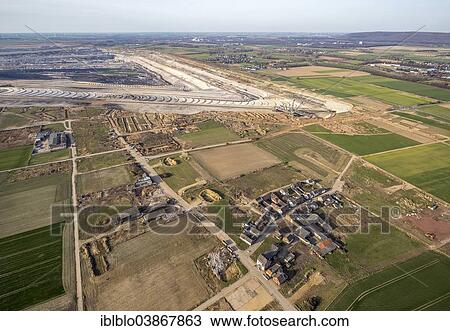 "Aerial view, Inden open-cast lignite mine with the destroyed village of Inden, North Rhine-Westphalia, Germany, Europe" View Large Photo Image Stock Image - "Aerial view, Inden open-cast lignite mine with the destroyed village of Inden, North Rhine-Westphalia, Germany, Europe". Fotosearch