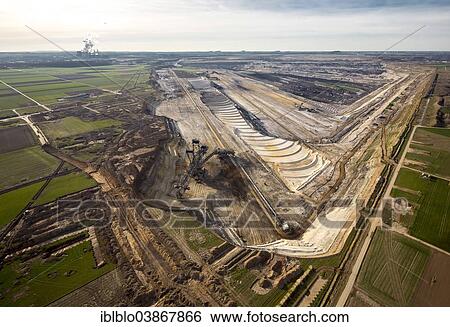 "Aerial view, Inden open-cast lignite mine with the destroyed village of Inden, North Rhine-Westphalia, Germany, Europe" View Large Photo Image Stock Photograph - "Aerial view, Inden open-cast lignite mine with the destroyed village of Inden, North Rhine-Westphalia, Germany, Europe". Fotosearch