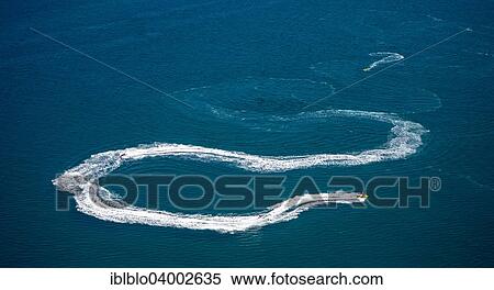Stock Photography - "Aerial view, jetski on the Mediterranean off Leucate, Le Barcares, Languedoc-Roussillon, France, Europe". Fotosearch