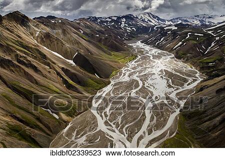 "Aerial view, Joekulgilkvisl braided river, rhyolite mountains partially covered with snow, Landmannalaugar, Fjallabak conservation area, Icelandic Highlands, Iceland, Europe" View Large Photo Image Stock Image - "Aerial view, Joekulgilkvisl braided river, rhyolite mountains partially covered with snow, Landmannalaugar, Fjallabak conservation area, Icelandic Highlands, Iceland, Europe". Fotosearch