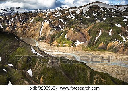 "Aerial view, Joekulgilkvisl braided river, rhyolite mountains partially covered with snow, Landmannalaugar, Fjallabak conservation area, Icelandic Highlands, Iceland, Europe" View Large Photo Image Stock Photo - "Aerial view, Joekulgilkvisl braided river, rhyolite mountains partially covered with snow, Landmannalaugar, Fjallabak conservation area, Icelandic Highlands, Iceland, Europe". Fotosearch