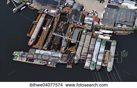 "Aerial view, Jonk shipyard, repair facility for inland water vessels, inland port of Harburg, Hamburg, Germany, Europe" View Large Photo Image Picture - "Aerial view, Jonk shipyard, repair facility for inland water vessels, inland port of Harburg, Hamburg, Germany, Europe". Fotosearch