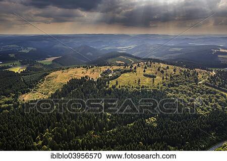 Stock Image - "Aerial view, Kahler Asten with low cloud cover, heath, Naturpark Rothaargebirge, Astenberg weather station, Winterberg, Sauerland, North Rhine-Westphalia, Germany, Europe". Fotosearch