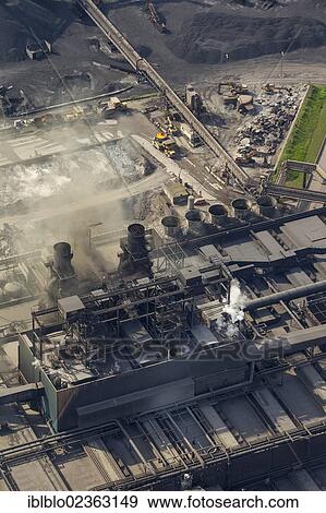"Aerial view, Krupp Mannesmann GmbH metallurgical plant, steel works, coke oven smoke, Duisburg, Ruhr Area, North Rhine-Westphalia, Germany, Europe" View Large Photo Image Stock Photo - "Aerial view, Krupp Mannesmann GmbH metallurgical plant, steel works, coke oven smoke, Duisburg, Ruhr Area, North Rhine-Westphalia, Germany, Europe". Fotosearch