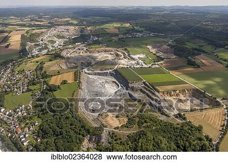 "Aerial view, Kupferkuhle Quarry, Warsteiner Kalkwerk GmbH & Co. KG, Warstein, Sauerland, North Rhine-Westphalia, Germany, Europe" View Large Photo Image Stock Photo - "Aerial view, Kupferkuhle Quarry, Warsteiner Kalkwerk GmbH & Co. KG, Warstein, Sauerland, North Rhine-Westphalia, Germany, Europe". Fotosearch