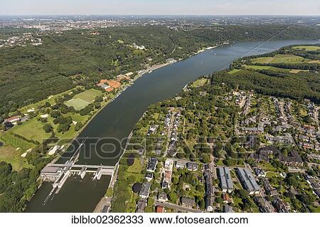 "Aerial view, Lake Baldeneysee with a weir, Essen-Werden, Essen, Ruhr region, North Rhine-Westphalia, Germany, Europe" View Large Photo Image Stock Image - "Aerial view, Lake Baldeneysee with a weir, Essen-Werden, Essen, Ruhr region, North Rhine-Westphalia, Germany, Europe". Fotosearch
