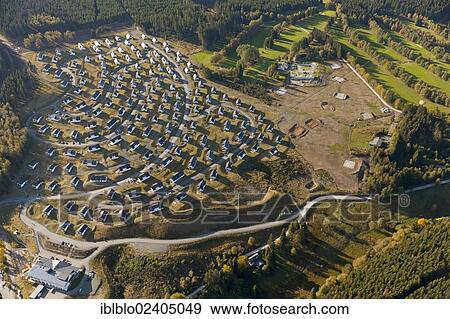 Stock Photo - "Aerial view, Landal Greenparks GmbH, holiday cottages, Winterberg, Sauerland, North Rhine-Westphalia, Germany, Europe". Fotosearch