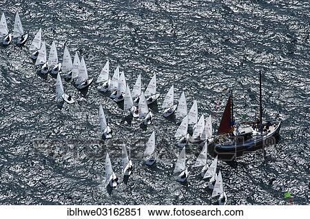 "Aerial view, laser sailing boats during Kiel Week, start of a regatta, starting line, Kiel, Schleswig-Holstein, Germany, Europe" View Large Photo Image Stock Image - "Aerial view, laser sailing boats during Kiel Week, start of a regatta, starting line, Kiel, Schleswig-Holstein, Germany, Europe". Fotosearch