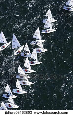 "Aerial view, laser sailing boats during Kiel Week, start of a regatta, starting line, Kiel, Schleswig-Holstein, Germany, Europe" View Large Photo Image Stock Image - "Aerial view, laser sailing boats during Kiel Week, start of a regatta, starting line, Kiel, Schleswig-Holstein, Germany, Europe". Fotosearch