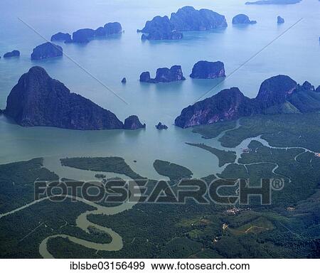 Stock Photo - "Aerial view, limestone cliffs and a river mouth, Ao Phang Nga National Park, Phang Nga Province, Thailand, Asia". Fotosearch