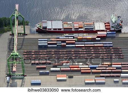 "Aerial view, loading containers from ship on rail, Container Terminal Lubeck, Lubeck, Schleswig-Holstein, Germany, Europe" View Large Photo Image Stock Image - "Aerial view, loading containers from ship on rail, Container Terminal Lubeck, Lubeck, Schleswig-Holstein, Germany, Europe". Fotosearch