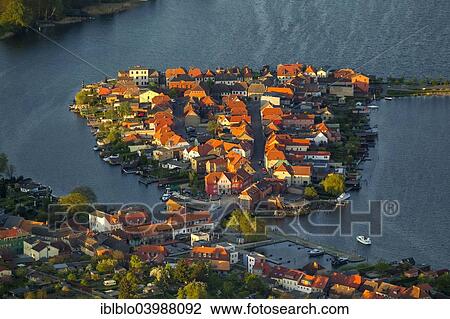 "Aerial view, Malchow with Malchower See lake and the island with the historic centre and its old market square, Malchow, Mecklenburg Lake District, Mecklenburg-Western Pomerania, Germany, Europe" View Large Photo Image Stock Image - "Aerial view, Malchow with Malchower See lake and the island with the historic centre and its old market square, Malchow, Mecklenburg Lake District, Mecklenburg-Western Pomerania, Germany, Europe". Fotosearch