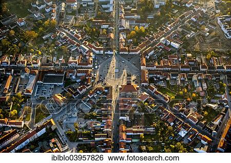 "Aerial view, market square with eight axis and roundabout, City Hall and City Church, Neustrelitz, Mecklenburg-Western Pomerania, Germany, Europe" View Large Photo Image Stock Photograph - "Aerial view, market square with eight axis and roundabout, City Hall and City Church, Neustrelitz, Mecklenburg-Western Pomerania, Germany, Europe". Fotosearch