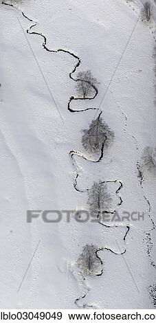 "Aerial view, meandering stream in winter, Naturpark Rothaargebierge, Winterberg, Sauerland, Hochsauerlandkreis, North Rhine-Westphalia, Germany, Europe" View Large Photo Image Stock Photo - "Aerial view, meandering stream in winter, Naturpark Rothaargebierge, Winterberg, Sauerland, Hochsauerlandkreis, North Rhine-Westphalia, Germany, Europe". Fotosearch