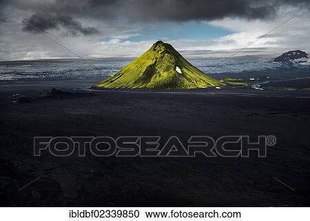 "Aerial view, moss-covered Maelifell Mountain, black sand of Maelifellssandur Desert, Icelandic Highlands, Iceland, Europe" View Large Photo Image Stock Image - "Aerial view, moss-covered Maelifell Mountain, black sand of Maelifellssandur Desert, Icelandic Highlands, Iceland, Europe". Fotosearch