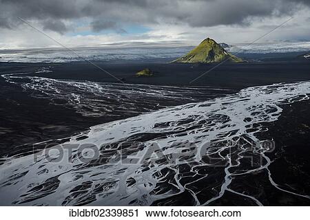 "Aerial view, moss-covered Maelifell Mountain, black sand of Maelifellssandur Desert, Icelandic Highlands, Iceland, Europe" View Large Photo Image Stock Image - "Aerial view, moss-covered Maelifell Mountain, black sand of Maelifellssandur Desert, Icelandic Highlands, Iceland, Europe". Fotosearch
