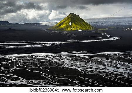 "Aerial view, moss-covered Maelifell Mountain, black sand of Maelifellssandur Desert, sandur outwash plain, Icelandic Highlands, Iceland, Europe" View Large Photo Image Stock Photography - "Aerial view, moss-covered Maelifell Mountain, black sand of Maelifellssandur Desert, sandur outwash plain, Icelandic Highlands, Iceland, Europe". Fotosearch