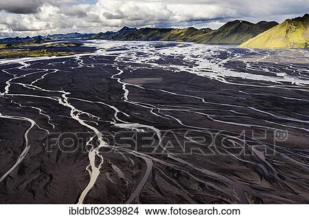 "Aerial view, moss-covered mountains and the black sand of Maelifellssandur Desert, Icelandic Highlands, Iceland, Europe" View Large Photo Image Picture - "Aerial view, moss-covered mountains and the black sand of Maelifellssandur Desert, Icelandic Highlands, Iceland, Europe". Fotosearch
