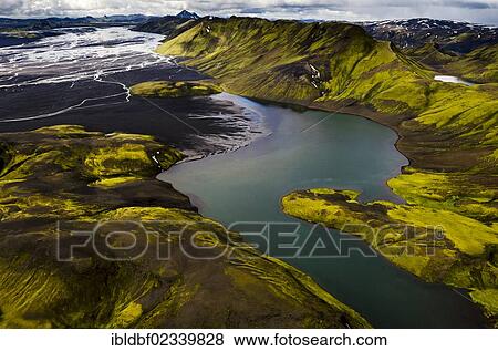 "Aerial view, moss-covered mountains and the black sand of Maelifellssandur Desert, Icelandic Highlands, Iceland, Europe" View Large Photo Image Stock Photo - "Aerial view, moss-covered mountains and the black sand of Maelifellssandur Desert, Icelandic Highlands, Iceland, Europe". Fotosearch