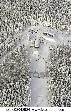 "Aerial view, mountain station of the ski lift in winter, Winterberg, Winterberg, Sauerland, Hochsauerlandkreis, North Rhine-Westphalia, Germany, Europe" View Large Photo Image Picture - "Aerial view, mountain station of the ski lift in winter, Winterberg, Winterberg, Sauerland, Hochsauerlandkreis, North Rhine-Westphalia, Germany, Europe". Fotosearch