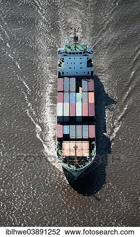 "Aerial view, MS Klenoden, feeder vessel, on the Elbe River, Hamburg, Germany, Europe" View Large Photo Image Stock Image - "Aerial view, MS Klenoden, feeder vessel, on the Elbe River, Hamburg, Germany, Europe". Fotosearch