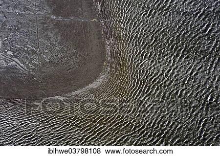 "Aerial view, mudflats on the Elbe river at low tide, Brunsbuttel, Schleswig-Holstein, Germany, Europe" View Large Photo Image Stock Photo - "Aerial view, mudflats on the Elbe river at low tide, Brunsbuttel, Schleswig-Holstein, Germany, Europe". Fotosearch
