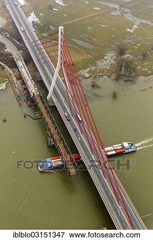 Stock Photo - "Aerial view, new and old bridge over the Rhine, Voerde, North Rhine-Westphalia, Germany, Europe". Fotosearch