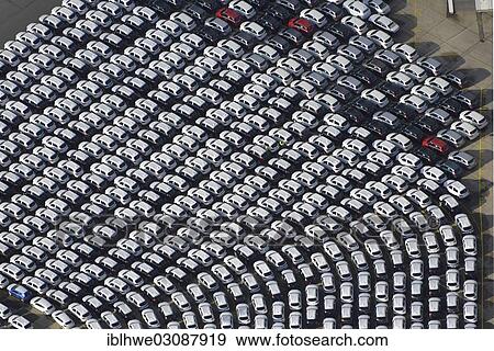 Stock Photo - "Aerial view, new cars waiting for transport, at Unikai terminal in the Port of Hamburg, Hamburg, Hamburg, Germany, Europe". Fotosearch
