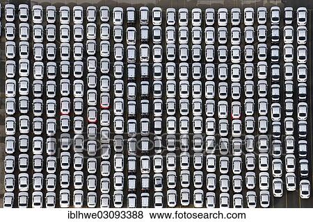 "Aerial view, new cars waiting for transport, at Unikai terminal in the Port of Hamburg, Hamburg, Hamburg, Germany, Europe" View Large Photo Image Stock Photo - "Aerial view, new cars waiting for transport, at Unikai terminal in the Port of Hamburg, Hamburg, Hamburg, Germany, Europe". Fotosearch