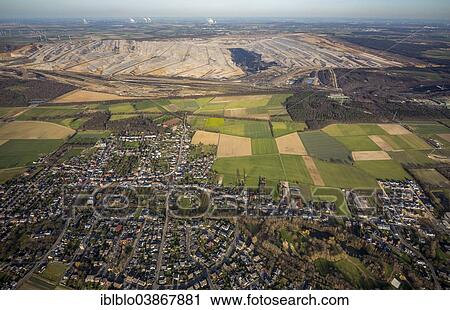 Stock Image - "Aerial view, Niederzier open-cast lignite mine, Niederzier, North Rhine-Westphalia, Germany, Europe". Fotosearch