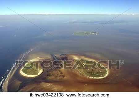 "Aerial view, Nigehoern Island, left, and Scharhoern Island, right, in the Hamburg Wadden Sea, Neuwerk, Hamburg, Hamburg, Germany, Europe" View Large Photo Image Stock Photo - "Aerial view, Nigehoern Island, left, and Scharhoern Island, right, in the Hamburg Wadden Sea, Neuwerk, Hamburg, Hamburg, Germany, Europe". Fotosearch