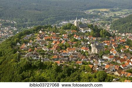 Stock Photo - "Aerial view, Obermarsberg with the St. Nikolai Church and the Collegiate Church of St. Peter and Paul, Obermarsberg, Marsberg, North Rhine-Westphalia, Germany, Europe". Fotosearch
