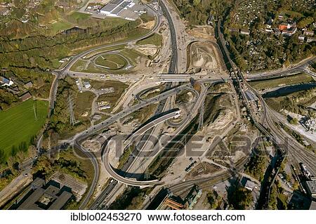 "Aerial view of a motorway intersection under construction, A40 B1 Donezk-Ring construction site, Wattenscheid, Bochum, Ruhr area, North Rhine-Westphalia, Germany, Europe" View Large Photo Image Stock Image - "Aerial view of a motorway intersection under construction, A40 B1 Donezk-Ring construction site, Wattenscheid, Bochum, Ruhr area, North Rhine-Westphalia, Germany, Europe". Fotosearch