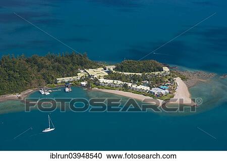 Stock Image - "Aerial view of Airlie Beach, Whitsunday Region, Queensland, Australia, Oceania". Fotosearch