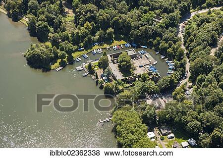 "Aerial view of Haus Scheppen building on Lake Baldeneysee, Essen, Ruhr region, North Rhine-Westphalia, Germany, Europe" View Large Photo Image Stock Photo - "Aerial view of Haus Scheppen building on Lake Baldeneysee, Essen, Ruhr region, North Rhine-Westphalia, Germany, Europe". Fotosearch