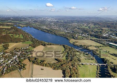 "Aerial view of Kemnader Stausee dam, weir, Ruhr valley, Ruhr river, Bochum, Ruhr area, North Rhine-Westphalia, Germany, Europe" View Large Photo Image Stock Photo - "Aerial view of Kemnader Stausee dam, weir, Ruhr valley, Ruhr river, Bochum, Ruhr area, North Rhine-Westphalia, Germany, Europe". Fotosearch