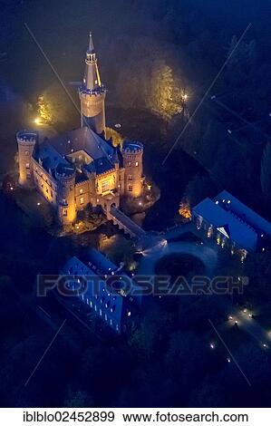 "Aerial view of Moyland moated castle, neo-Gothic style, night shot, Bedburg-Hau, North Rhine-Westphalia, Germany, Europe" View Large Photo Image Stock Photo - "Aerial view of Moyland moated castle, neo-Gothic style, night shot, Bedburg-Hau, North Rhine-Westphalia, Germany, Europe". Fotosearch