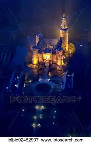 "Aerial view of Moyland moated castle, neo-Gothic style, night shot, Bedburg-Hau, North Rhine-Westphalia, Germany, Europe" View Large Photo Image Stock Photo - "Aerial view of Moyland moated castle, neo-Gothic style, night shot, Bedburg-Hau, North Rhine-Westphalia, Germany, Europe". Fotosearch