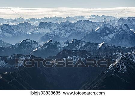 Stock Photography - "Aerial view of the Alps looking towards the south, near Garmisch-Partenkirchen, Upper Bavaria, Bavaria, Germany, Europe". Fotosearch