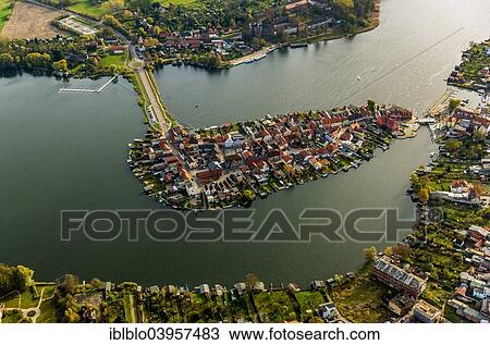 Stock Image - "Aerial view, old town island with Lake Malchow, Malchow, Mecklenburg-Western Pomerania, Germany, Europe". Fotosearch