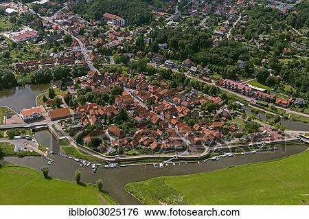 Stock Photograph - "Aerial view, old town of Hitzacker with tributary streams Jeetzel and Altjeetzel, Elbe River, Hitzacker, Landkreis Luchow-Dannenberg, Lower Saxony, Germany, Europe". Fotosearch