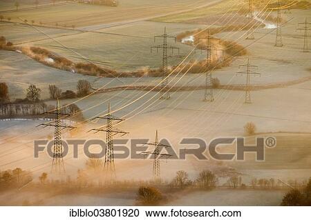 Stock Image - "Aerial view, overhead power lines, Lippeauen, Hamm, Ruhr area, North Rhine-Westphalia, Germany, Europe". Fotosearch