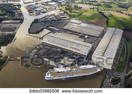 "Aerial view, Papenburg Emshaven port with Jos. L. Meyer Werft shipyard and the cruise ship Quantum of the Seas, Royal Caribbean, Papenburg, Emsland, Lower Saxony, Germany, Europe" View Large Photo Image Stock Photograph - "Aerial view, Papenburg Emshaven port with Jos. L. Meyer Werft shipyard and the cruise ship Quantum of the Seas, Royal Caribbean, Papenburg, Emsland, Lower Saxony, Germany, Europe". Fotosearch