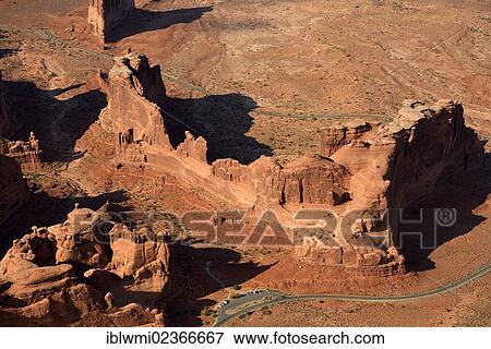 Stock Photo - "Aerial view, Park Avenue Trailhead and Viewpoint, Courthouse Tower, Courthouse Towers section, scenic road, Arches National Park, Moab, Utah, United States of America, USA". Fotosearch