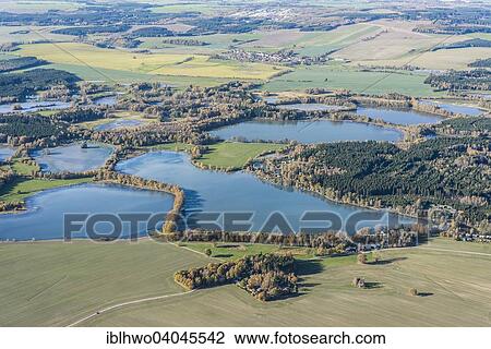 "Aerial view, Plothener Teiche, important nature park reserve, a resting place for migratory birds, artificial lakes, Thuringian Slate Mountains Upper Saale nature park, Saale-Orla-Kreis, Thuringia, Germany, Europe" View Large Photo Image Stock Image - "Aerial view, Plothener Teiche, important nature park reserve, a resting place for migratory birds, artificial lakes, Thuringian Slate Mountains Upper Saale nature park, Saale-Orla-Kreis, Thuringia, Germany, Europe". Fotosearch