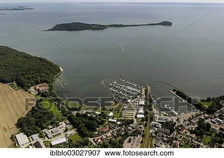 "Aerial view, port of Lauterbach looking towards the holiday island of Vilm, Lauterbach, Putbus, Rugen, Mecklenburg-Western Pomerania, Germany, Europe" View Large Photo Image Stock Photo - "Aerial view, port of Lauterbach looking towards the holiday island of Vilm, Lauterbach, Putbus, Rugen, Mecklenburg-Western Pomerania, Germany, Europe". Fotosearch