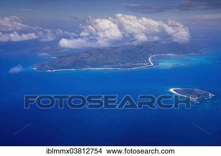 Picture - "Aerial view, Praslin Island, right Cousin Island, Seychelles, Africa". Fotosearch