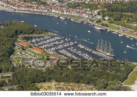 "Aerial view, Priwall Baltic Sea Station, yacht harbour, Seglermesse restaurant, Lubeck-Travemunde, Travemunde, Lubeck, Schleswig-Holstein, Germany, Europe" View Large Photo Image Picture - "Aerial view, Priwall Baltic Sea Station, yacht harbour, Seglermesse restaurant, Lubeck-Travemunde, Travemunde, Lubeck, Schleswig-Holstein, Germany, Europe". Fotosearch