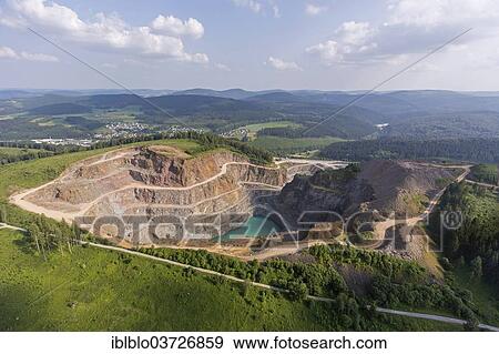 "Aerial view, quarry with a quarry lake, Rosenbeck, Brilon, North Rhine-Westphalia, Germany, Europe" View Large Photo Image Stock Photo - "Aerial view, quarry with a quarry lake, Rosenbeck, Brilon, North Rhine-Westphalia, Germany, Europe". Fotosearch